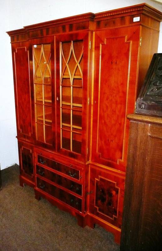 Lot 656 - A yew wood bookcase