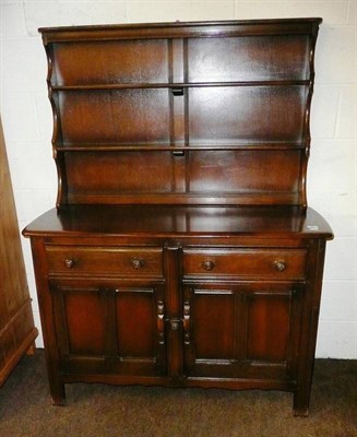 Lot 657 - A reproduction sideboard with dresser rack