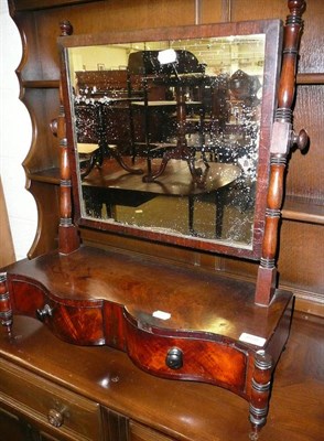 Lot 658 - A Regency serpentine fronted mahogany toilet mirror with brass inlay