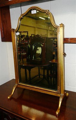 Lot 664 - A gilt mirror