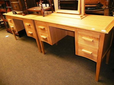 Lot 675 - Two oak dressing tables and a mirror