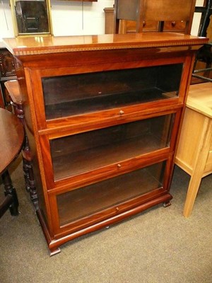 Lot 680 - A Globe Wernicke style mahogany three section bookcase