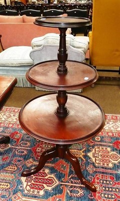 Lot 710 - A three tier mahogany dumb waiter