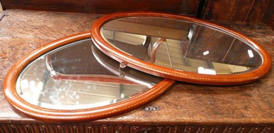 Lot 765 - Pair of oval wall mirrors