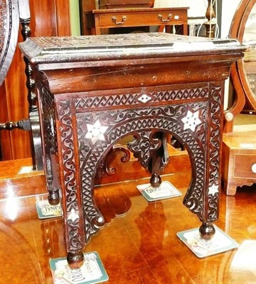 Lot 768 - A carved Moorish plant stand