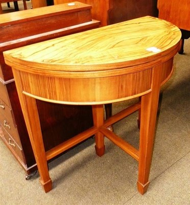 Lot 772 - A black walnut D-shaped card table