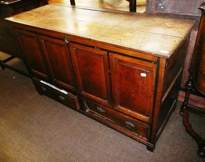 Lot 781 - An 18th century oak mule chest