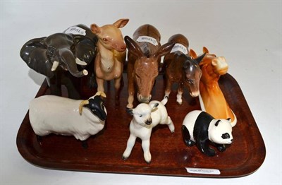 Lot 9 - Beswick doe, elephant, two donkeys, sheep, lambs, panda and a horse head plaque