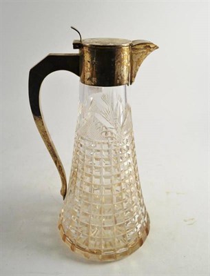 Lot 12 - A Walker & Hall silver-mounted claret jug, Sheffield hallmark, with a tapering body and...