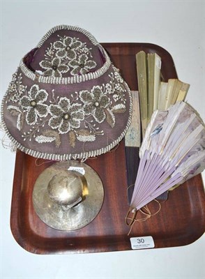 Lot 30 - A silver capstan inkwell, a beadwork wall pocket and a quantity of fans