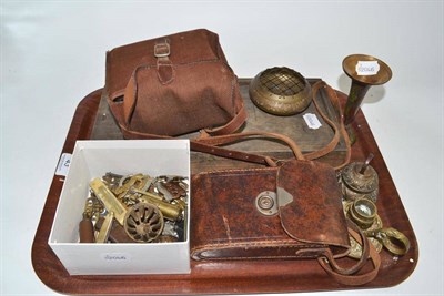 Lot 43 - A small quantity of military cap badges and shoulder titles, cigarette lighters, a whistle, two...