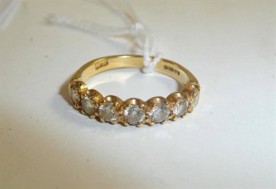 Lot 61 - An 18ct gold and diamond half eternity ring, 0.75 carat approximately