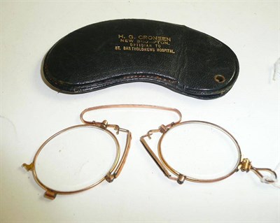 Lot 65 - A pair of pince-nez spectacles