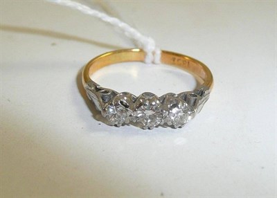 Lot 69 - A diamond three stone ring, stamped '18CT', 0.25 carat approximately