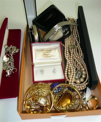 Lot 73 - A silver half engraved bangle, a charm bracelet, rings and assorted costume jewellery including...
