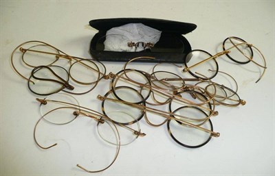 Lot 74 - Eight pairs of spectacles, some with a horn rim