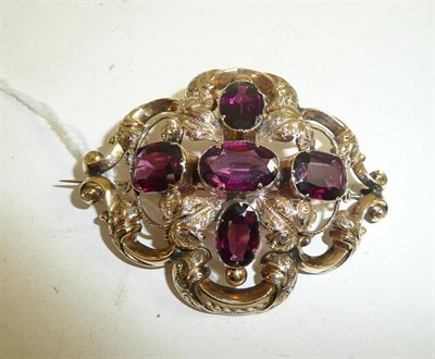 Lot 79 - A Victorian garnet set brooch