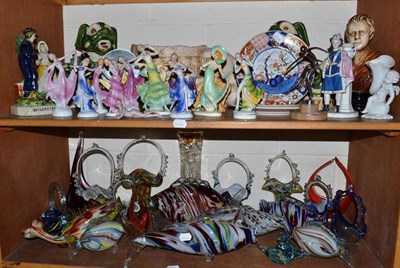 Lot 90 - Two shelves of decorative ceramics and glass including Art Deco dancing figures, Bretby monkey...
