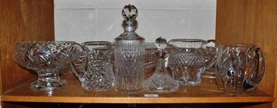 Lot 105 - A shelf of cut glass including bowls and decanters
