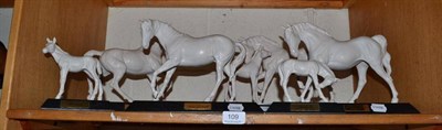 Lot 109 - Four white matt Beswick 'Spirit' series horses and two foals on plinths