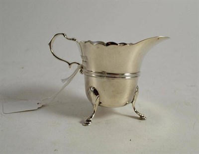 Lot 119 - An Edward VII silver cream jug, West and Son, Dublin 1905