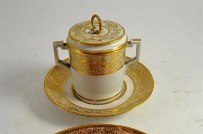 Lot 122 - A Crown Derby cup, cover and stand, decorated in the Seaweed pattern
