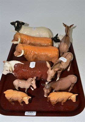 Lot 143 - Beswick including Highland cattle, donkeys, Hereford bull, pottery sheep and lamb etc (11 pieces)