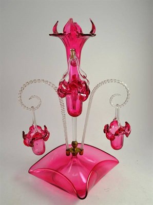 Lot 144 - A Victorian cranberry glass epergne