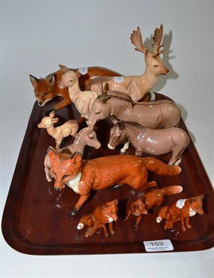 Lot 153 - Beswick including three donkeys, three deer, four foxes and another pottery fox