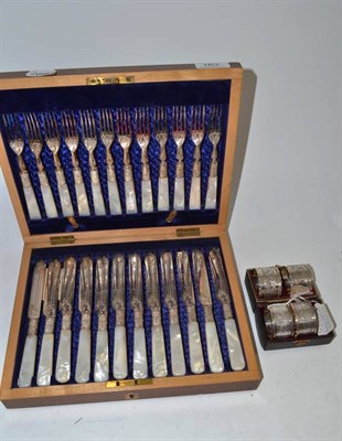 Lot 163 - A cased set of mother of pearl dessert knives and forks
