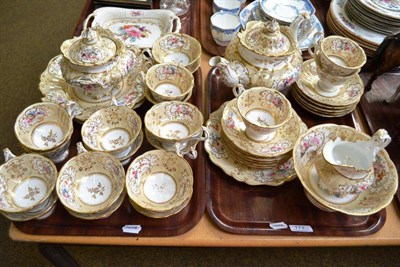 Lot 172 - A Rockingham style tea service including tea pot, lidded sucrier, cups and saucers, etc,...