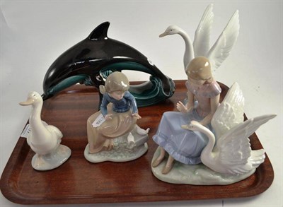 Lot 177 - Four Nao groups and a Poole pottery dolphin