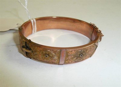 Lot 188 - A buckle bangle with worn stamp
