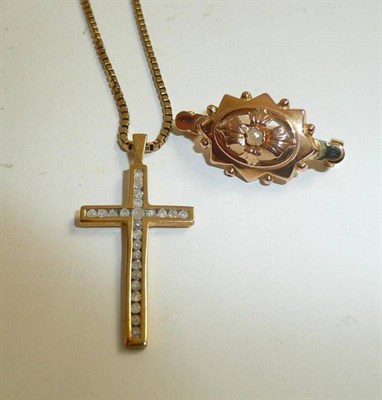 Lot 211 - A 9ct gold diamond set cross on a 9ct gold box link chain and a pearl set brooch