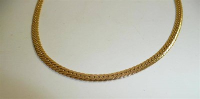 Lot 213 - A curb link necklace, stamped '750'