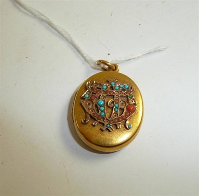 Lot 215 - A turquoise and coral set locket (a.f.)