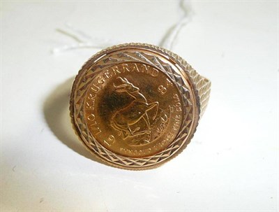 Lot 217 - A 1/10 Krugerand coin loose mounted as a ring