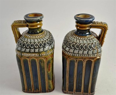 Lot 232 - A pair of Doulton stoneware spirit flasks