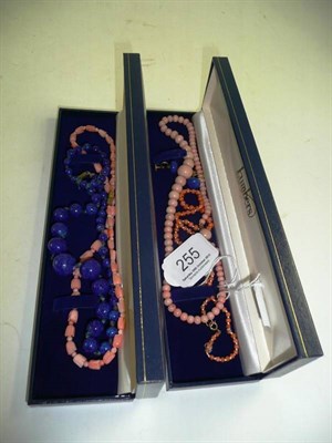 Lot 255 - Coral necklaces, a lapis lazuli necklace etc