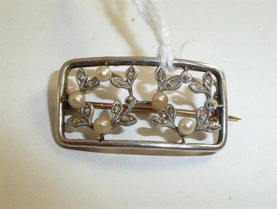 Lot 298 - An early 20th century seed pearl and rose cut diamond plaque brooch