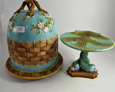 Lot 339 - A George Jones majolica cheese bell and stand (restored) together with a majolica tazza