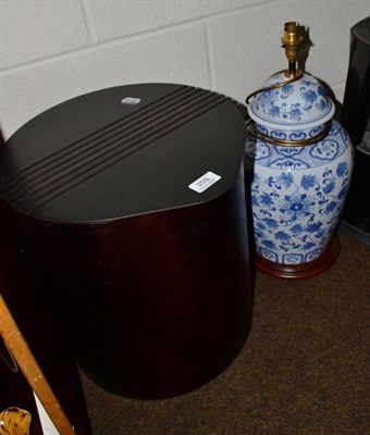 Lot 359 - Villa Italian wood laundry basket and a blue and white porcelain table lamp