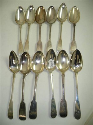 Lot 416 - Twelve silver table spoons engraved 'C'