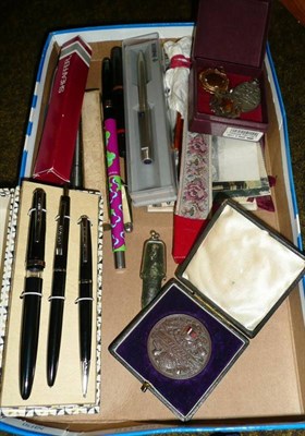 Lot 424 - Mixed collectables including fountain pens, pencils, sporting medals and postcards