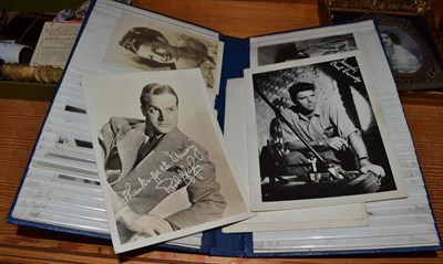 Lot 432 - An album of photographs of film and stage stars, some signed