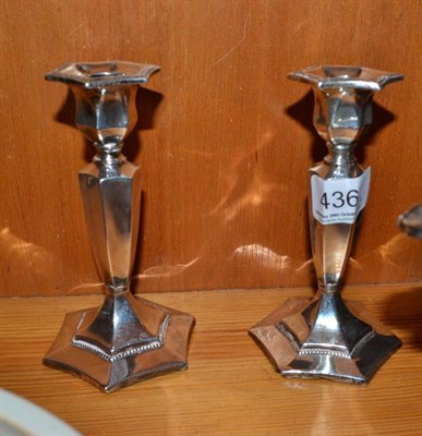 Lot 436 - Pair of loaded silver candlesticks