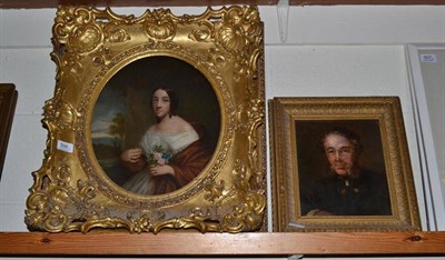 Lot 506 - 19th century English school portrait of a lady holding a posy ion a heavy gilt frame, 34.5cm x...