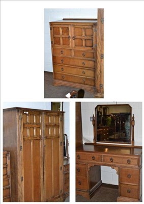 Lot 543 - Oak bedroom suite comprising double wardrobe, tall boy and dressing with table mirror