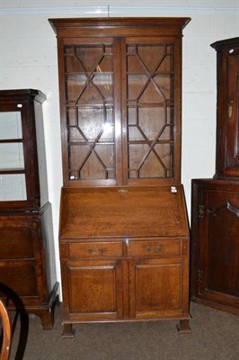 Lot 547 - Oak bureau bookcase