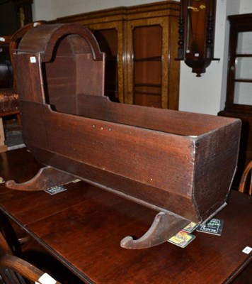 Lot 560 - 19th century oak cradle